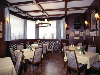 Ein Restaurant oder anderes Speiselokal in der Unterkunft Scheffel - Gasthof