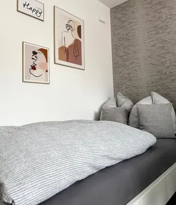 Ein Bett oder Betten in einem Zimmer der Unterkunft Solo by Zirwick Apartment