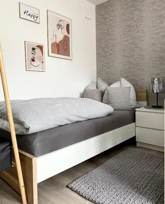 Ein Bett oder Betten in einem Zimmer der Unterkunft Solo by Zirwick Apartment