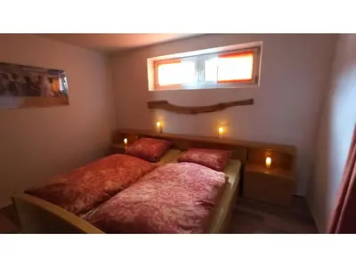 Ein Bett oder Betten in einem Zimmer der Unterkunft Ferienwohnung Lidwina