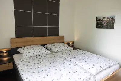 Ein Bett oder Betten in einem Zimmer der Unterkunft Ferienwohnung Magnolia