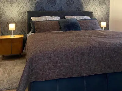 Ein Bett oder Betten in einem Zimmer der Unterkunft Ferienwohnung Pleystein