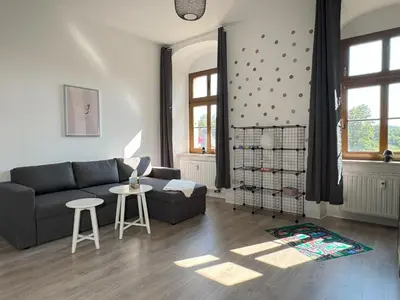 Ein Sitzbereich in der Unterkunft Ferienwohnung Plohn by Immo-Franzi
