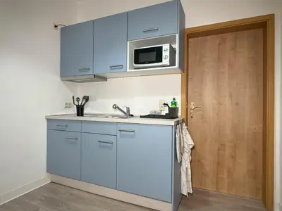 Küche/Küchenzeile in der Unterkunft Ferienwohnung Plohn by Immo-Franzi