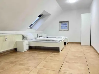 Ein Bett oder Betten in einem Zimmer der Unterkunft SWF112 - Gemütliche Monteurwohnung Übergangswohnung