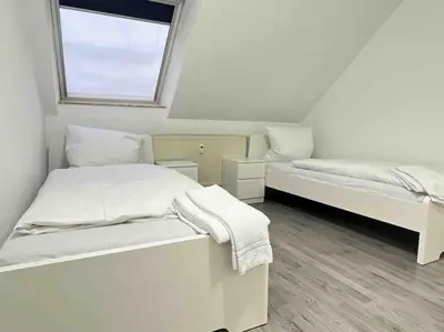 Ein Bett oder Betten in einem Zimmer der Unterkunft SWF112 - Gemütliche Monteurwohnung Übergangswohnung