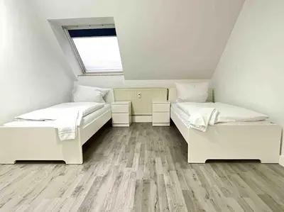 Ein Bett oder Betten in einem Zimmer der Unterkunft SWF112 - Gemütliche Monteurwohnung Übergangswohnung