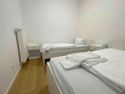 Ein Bett oder Betten in einem Zimmer der Unterkunft AM1014 - Modern eingerichtete Monteurwohnung Übergangswohnung