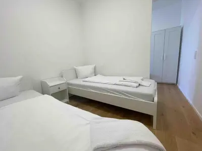 Ein Bett oder Betten in einem Zimmer der Unterkunft AM1014 - Modern eingerichtete Monteurwohnung Übergangswohnung