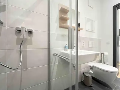 Ein Badezimmer in der Unterkunft AM1026 - Smarte Monteurwohnung Übergangswohnung