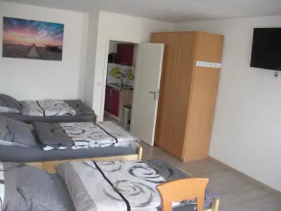 Ein Bett oder Betten in einem Zimmer der Unterkunft Wohnung für Monteure und Arbeiter bis 5 Personen Amberg