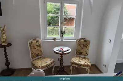 Ein Sitzbereich in der Unterkunft Schloss Hotel Colmdorf
