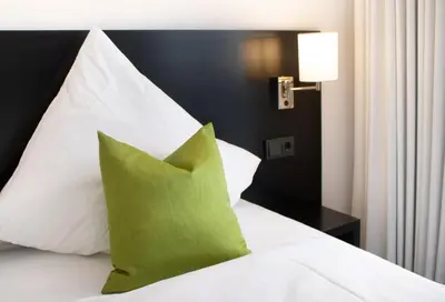 Ein Bett oder Betten in einem Zimmer der Unterkunft MSG Hotel by WMM Hotels