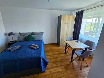 Ein Bett oder Betten in einem Zimmer der Unterkunft Werwein Stay