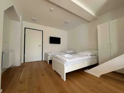 Ein Bett oder Betten in einem Zimmer der Unterkunft AM1114 - Moderne Monteurwohnung Übergangswohnung