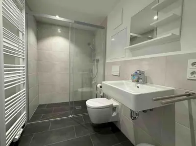 Ein Badezimmer in der Unterkunft AM1114 - Moderne Monteurwohnung Übergangswohnung