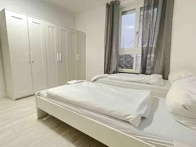 Ein Bett oder Betten in einem Zimmer der Unterkunft SWF111 - Komfortable Monteurwohnung Übergangswohnung