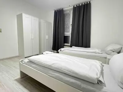 Ein Bett oder Betten in einem Zimmer der Unterkunft SWF111 - Komfortable Monteurwohnung Übergangswohnung