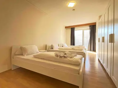 Ein Bett oder Betten in einem Zimmer der Unterkunft SWF121 - Gemütliche Monteurwohnung Übergangswohnung