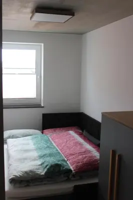 Ein Bett oder Betten in einem Zimmer der Unterkunft Apartments Patzina NEU 2024 - Kurort Oberwiesenthal