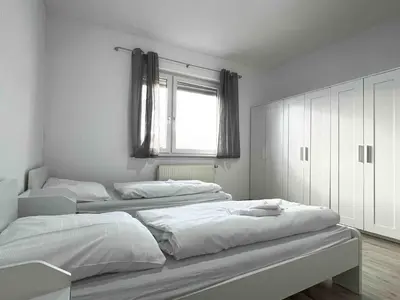 Ein Bett oder Betten in einem Zimmer der Unterkunft SAD701 - Große Monteurwohnung Übergangswohnung