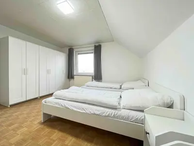 Ein Bett oder Betten in einem Zimmer der Unterkunft SAD702 - Schöne Monteurwohnung Übergangswohnung