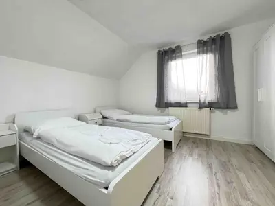 Ein Bett oder Betten in einem Zimmer der Unterkunft SAD702 - Schöne Monteurwohnung Übergangswohnung