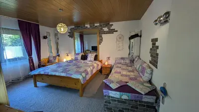 Ein Bett oder Betten in einem Zimmer der Unterkunft Landmanns Home