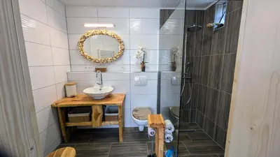Ein Badezimmer in der Unterkunft Landmanns Home