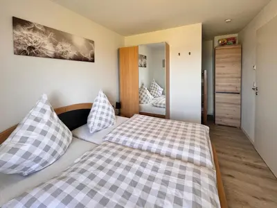 Ein Bett oder Betten in einem Zimmer der Unterkunft Ferienwohnungen Reutergut