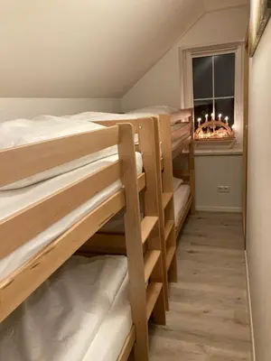Ein Bett oder Betten in einem Zimmer der Unterkunft Ferienwohnungen Reutergut