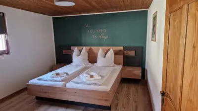 Ein Bett oder Betten in einem Zimmer der Unterkunft Ferienhaus Im Winkel