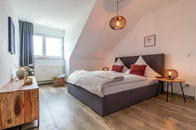 Ein Bett oder Betten in einem Zimmer der Unterkunft Panorama Apartment I Aufzug I Stellplatz I Natur