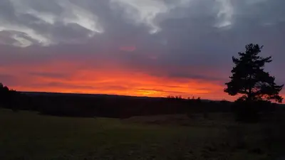Blick auf den Sonnenuntergang/Sonnenaufgang von des Privatzimmers aus oder aus der Nähe