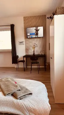 Ein Bett oder Betten in einem Zimmer der Unterkunft Apartment mit Netflix - Parken - Küche - Bad