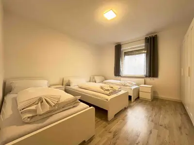 Ein Bett oder Betten in einem Zimmer der Unterkunft SAD802 - Zentrale Monteurwohnung
