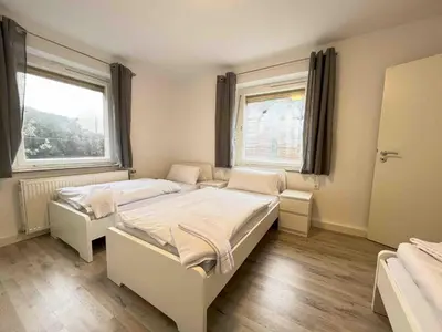 Ein Bett oder Betten in einem Zimmer der Unterkunft SAD801 - Geräumige Monteurwohnung