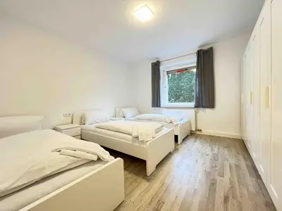 Ein Bett oder Betten in einem Zimmer der Unterkunft SAD801 - Geräumige Monteurwohnung