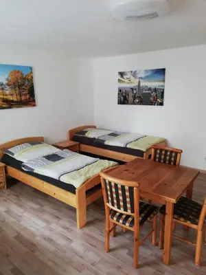 Ein Bett oder Betten in einem Zimmer der Unterkunft Wohnung für Arbeiter und Monteure bis 6 Personen Amberg