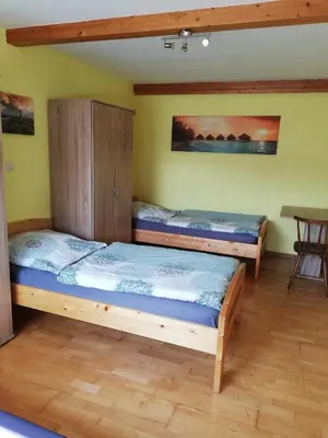 Ein Bett oder Betten in einem Zimmer der Unterkunft Wohnung für Arbeiter und Monteure bis 6 Personen Amberg