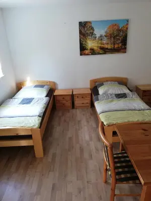 Ein Bett oder Betten in einem Zimmer der Unterkunft Wohnung für Arbeiter und Monteure bis 6 Personen Amberg