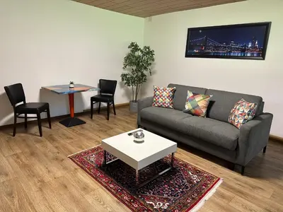 Ein Sitzbereich in der Unterkunft Ferienwohnung am Rosenbach