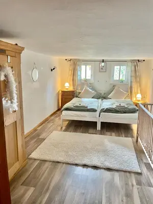Ein Bett oder Betten in einem Zimmer der Unterkunft Ferienhaus Erbse