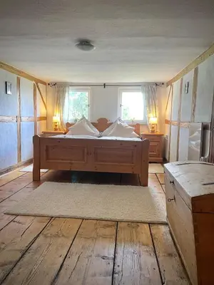 Ein Bett oder Betten in einem Zimmer der Unterkunft Ferienhaus Erbse