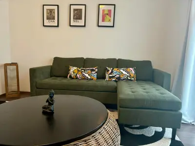 Ein Sitzbereich in der Unterkunft M & M Serviced Apartment
