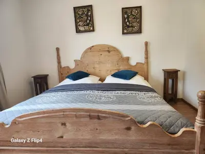Ein Bett oder Betten in einem Zimmer der Unterkunft M & M Serviced Apartment