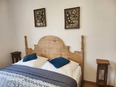 Ein Bett oder Betten in einem Zimmer der Unterkunft M & M Serviced Apartment