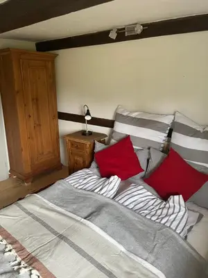 Ein Bett oder Betten in einem Zimmer der Unterkunft Seminar-& Gästehaus Sissy Baumann