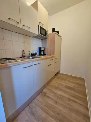 Küche/Küchenzeile in der Unterkunft familienfreundlich im Zentrum Citypoint