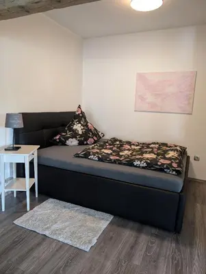 Ein Bett oder Betten in einem Zimmer der Unterkunft Ferienwohnung zum Hühnerstall